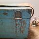 Antique wooden trunk with blue patina