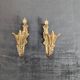 Pair of golden metal tiebacks