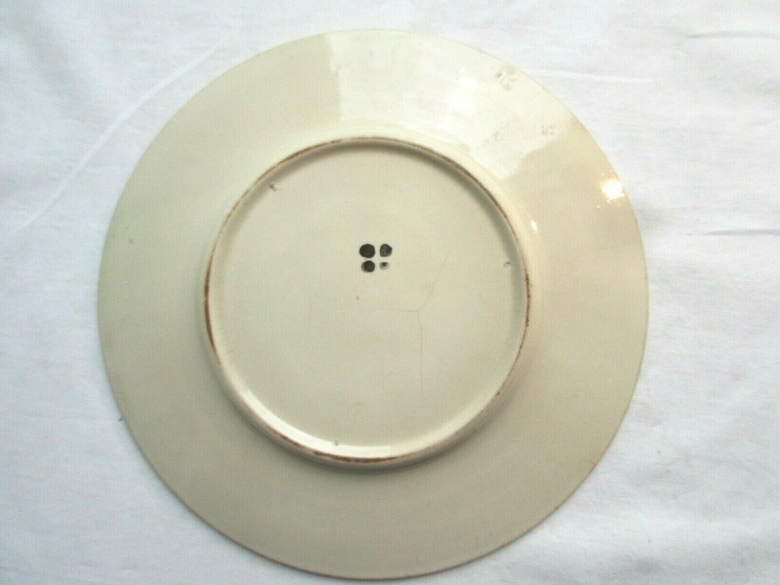Art Deco dabbling plate, muscaris and a butterfly.