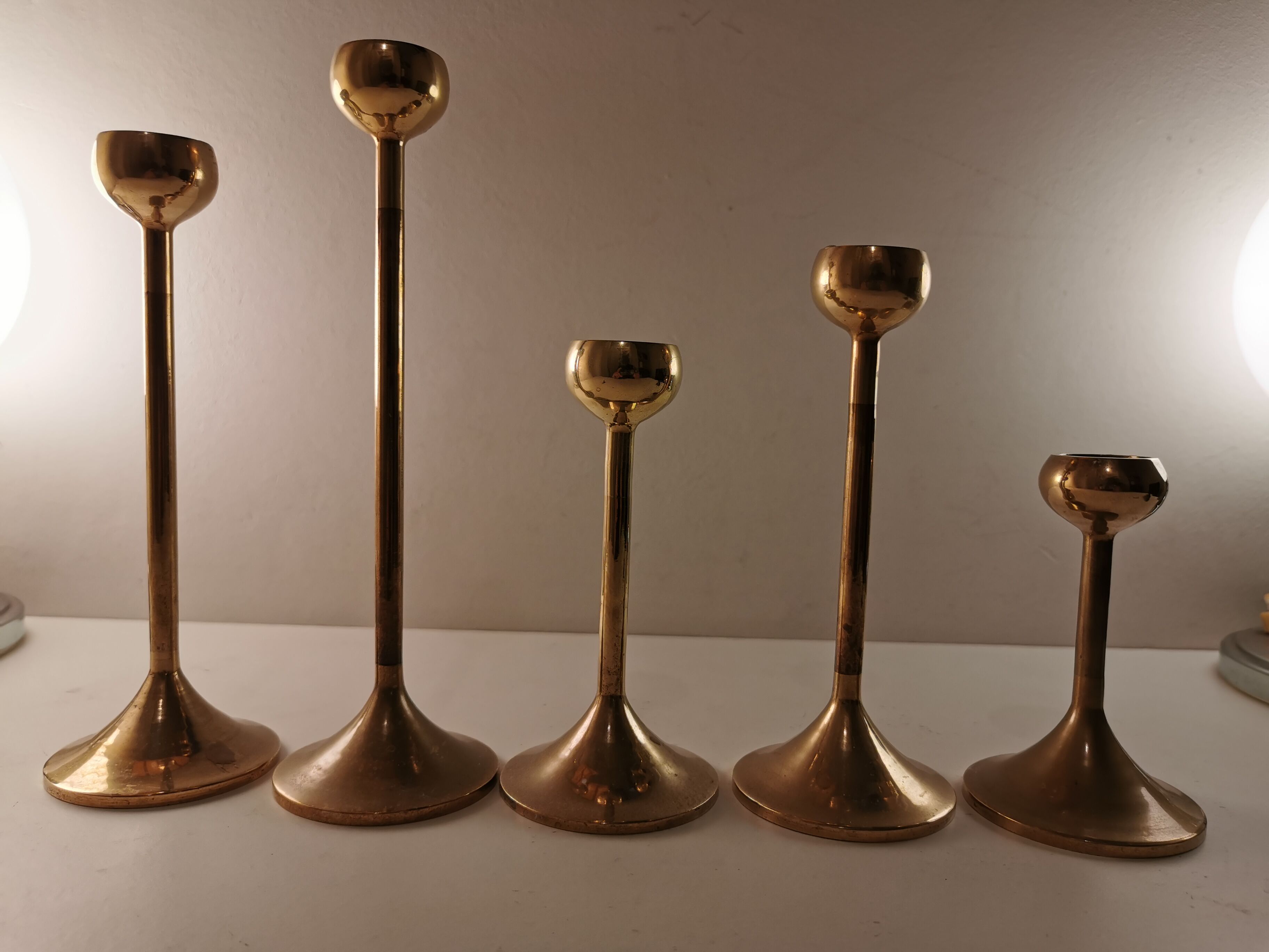Set of 5 brass candlesticks from the 70s