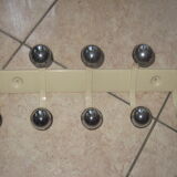 Coats vintage metal door has 5 hooks