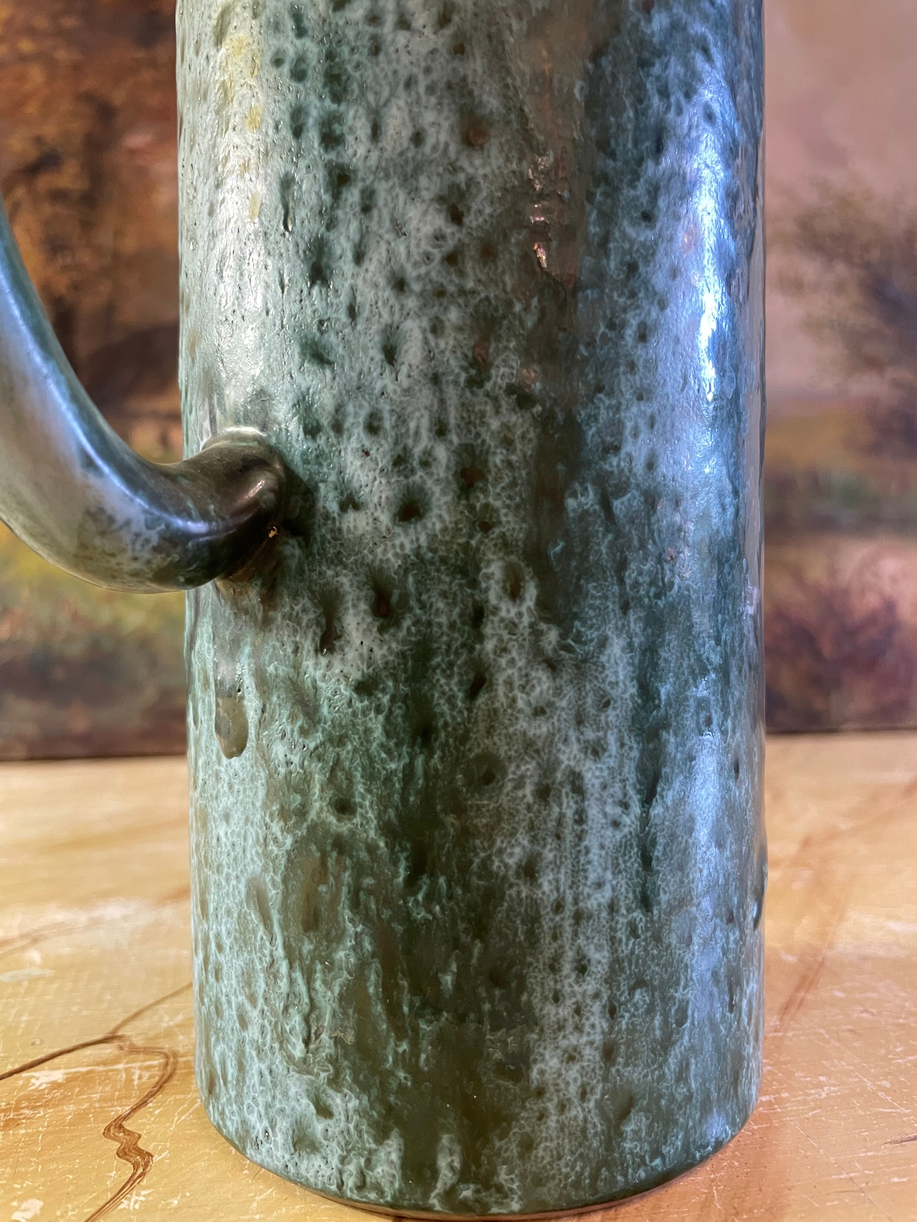 Blue ceramic pitcher