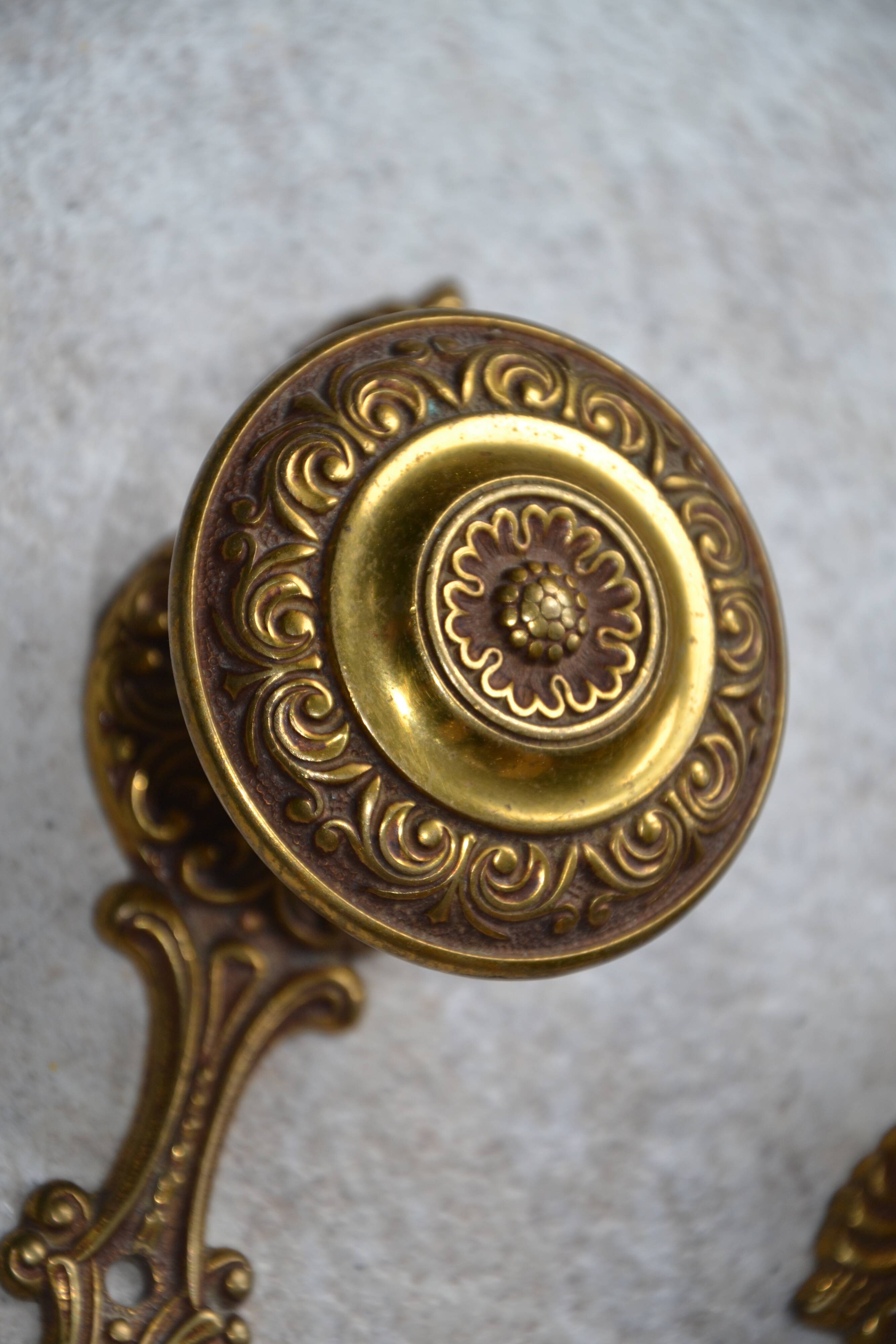 Three coat hooks with brass hook