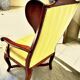 Wingback armchair in walnut in the French Regency style with stretcher in