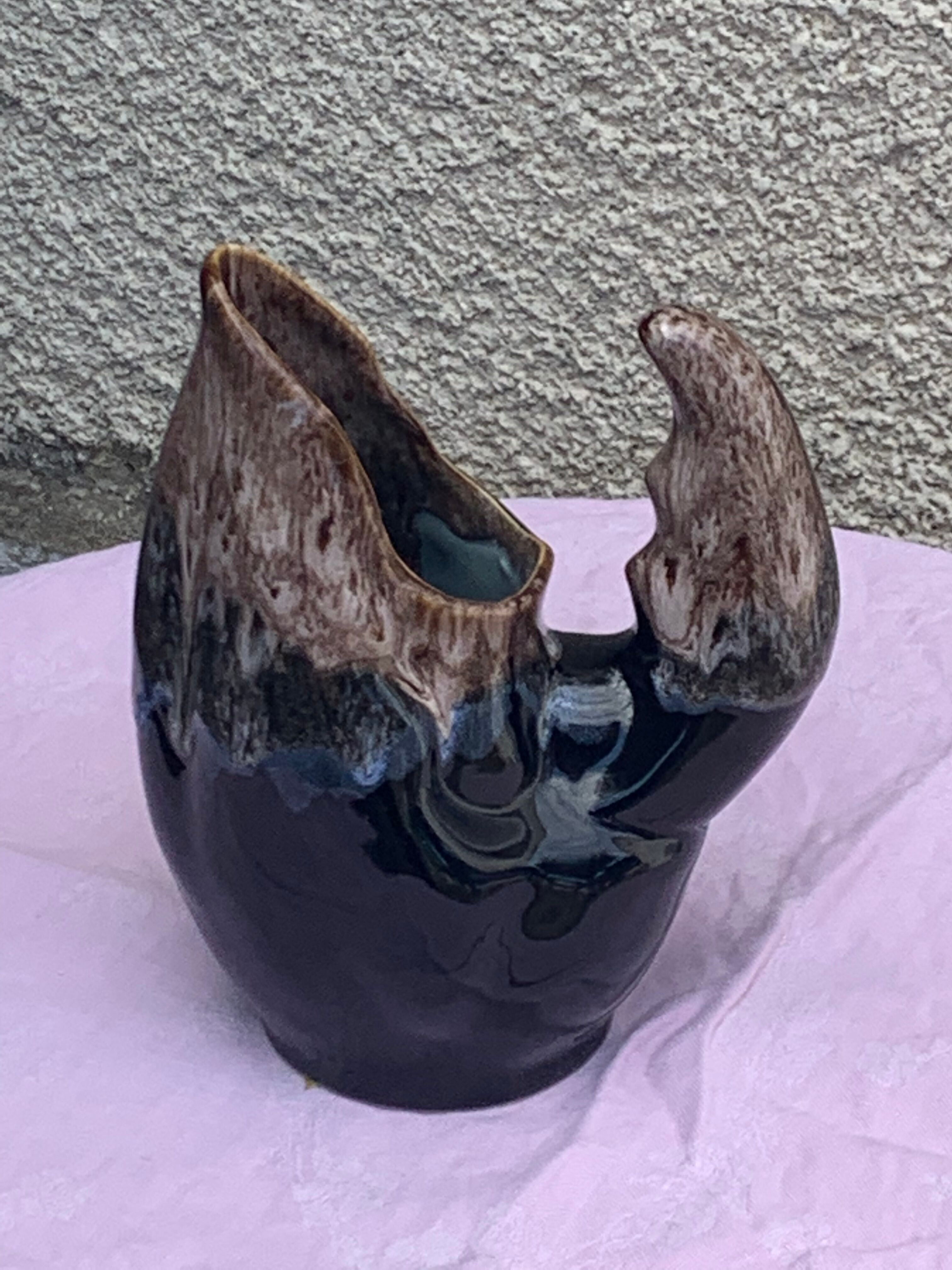 Vintage and numbered glazed ceramic decanter