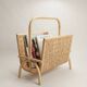 Vintage magazine rack in woven rattan and bamboo.