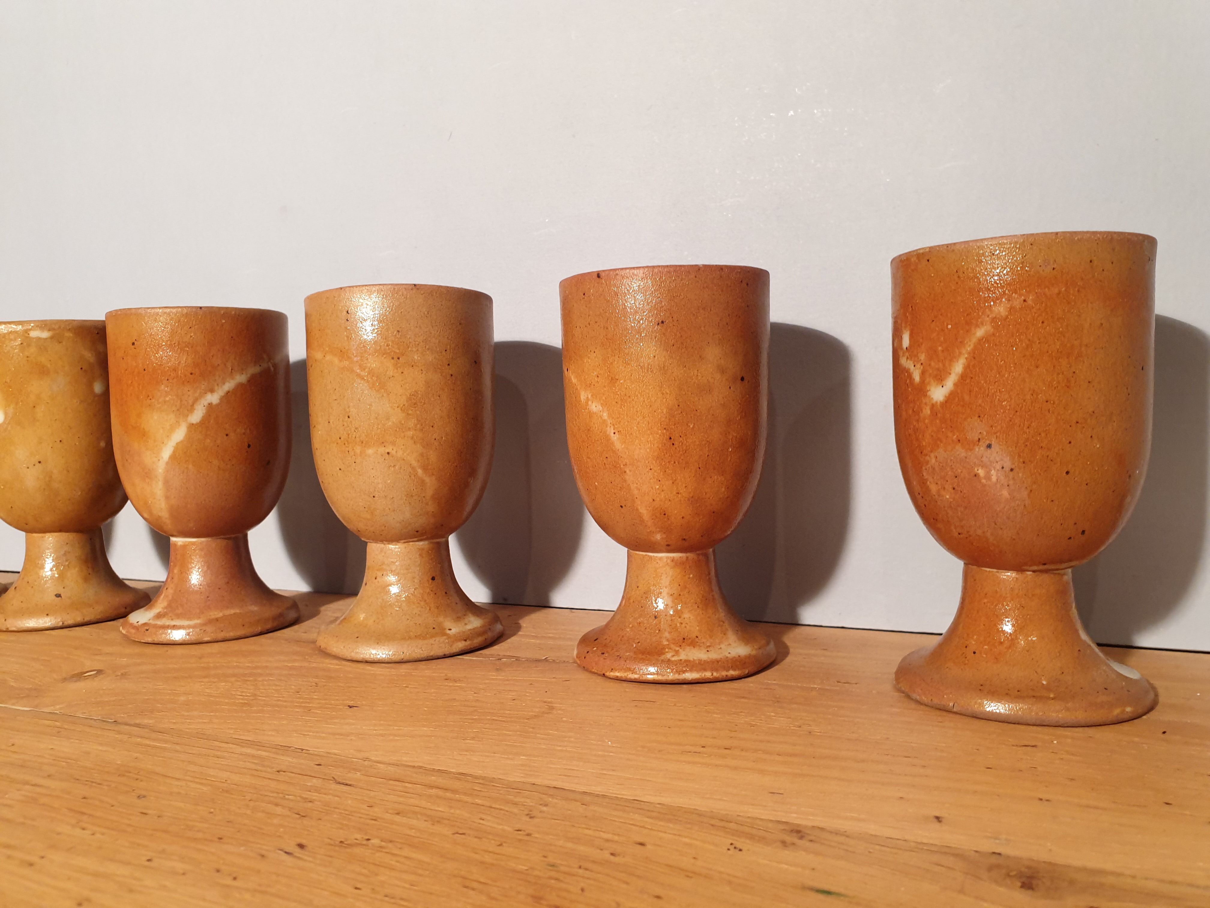 Set of 6 sandstone foot glasses