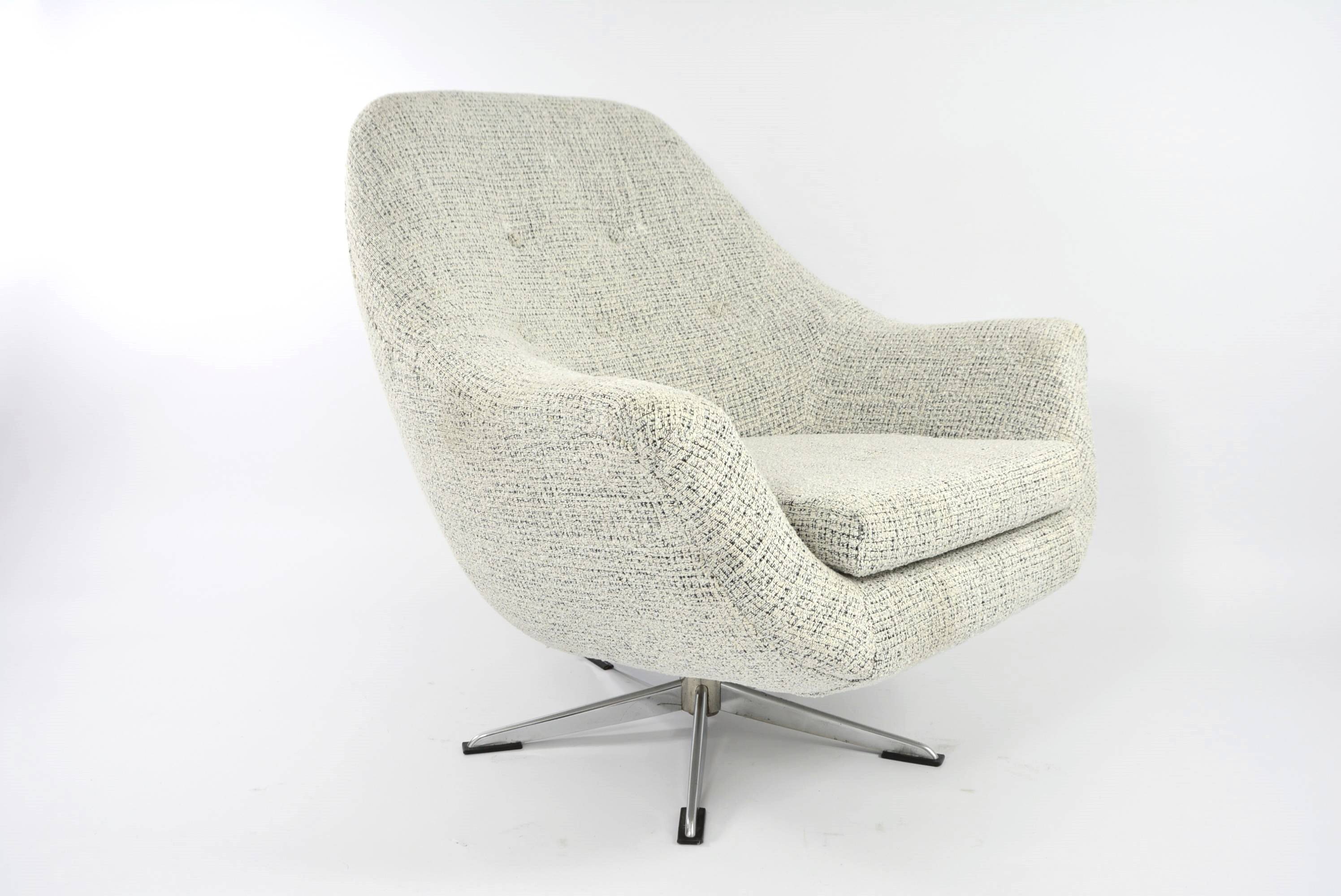 Swivel shell armchair