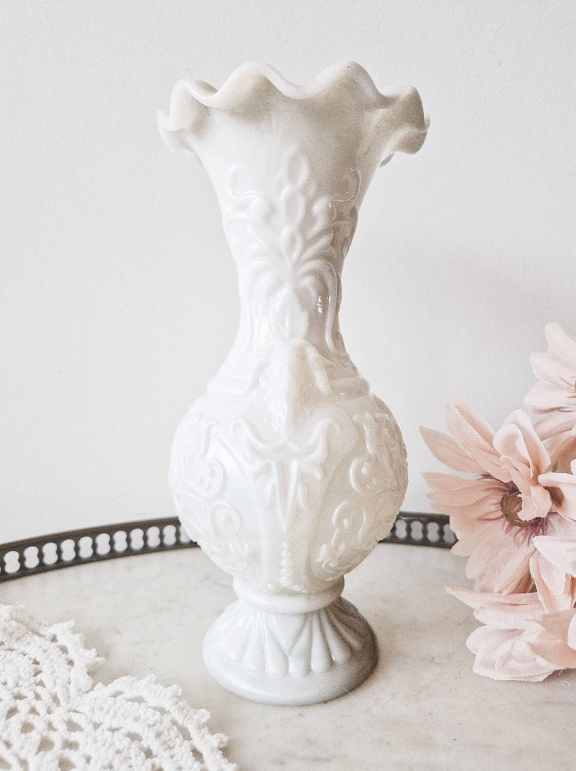 White opaline vase decorated with arabesques and ram's heads