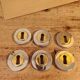 Rare vintage metal door lock fittings in gold and silver.