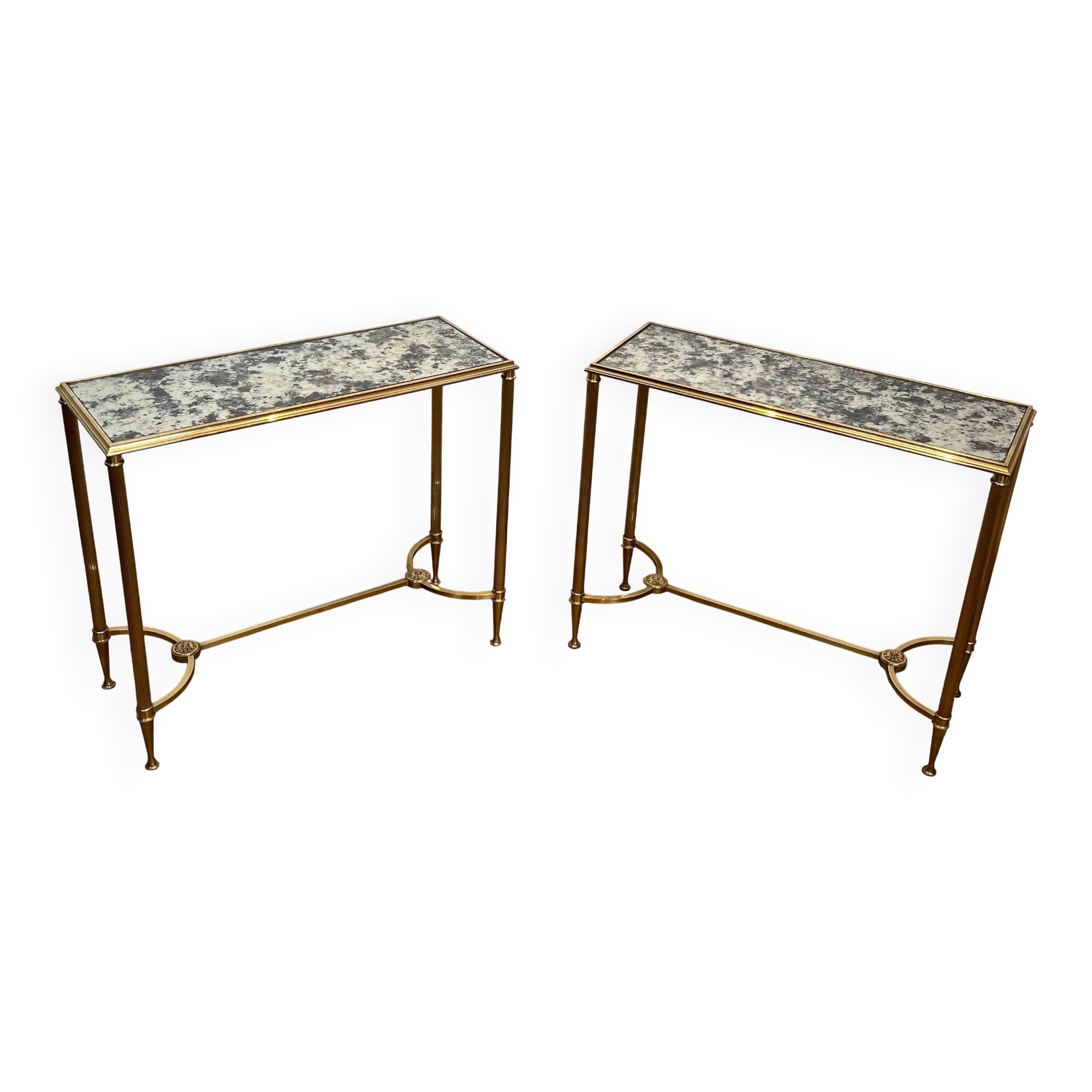 Pair of brass and antique mirror side tables from the Baguès house.