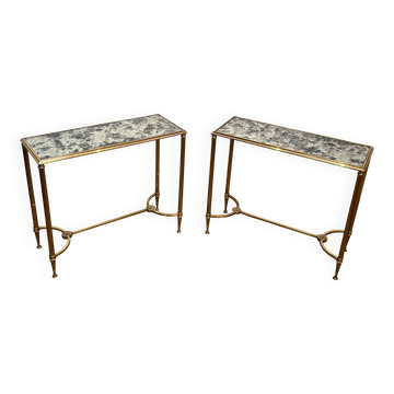 Pair of brass and antique mirror side tables from the Baguès house.