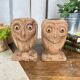 Pair of wooden "owl" candlesticks