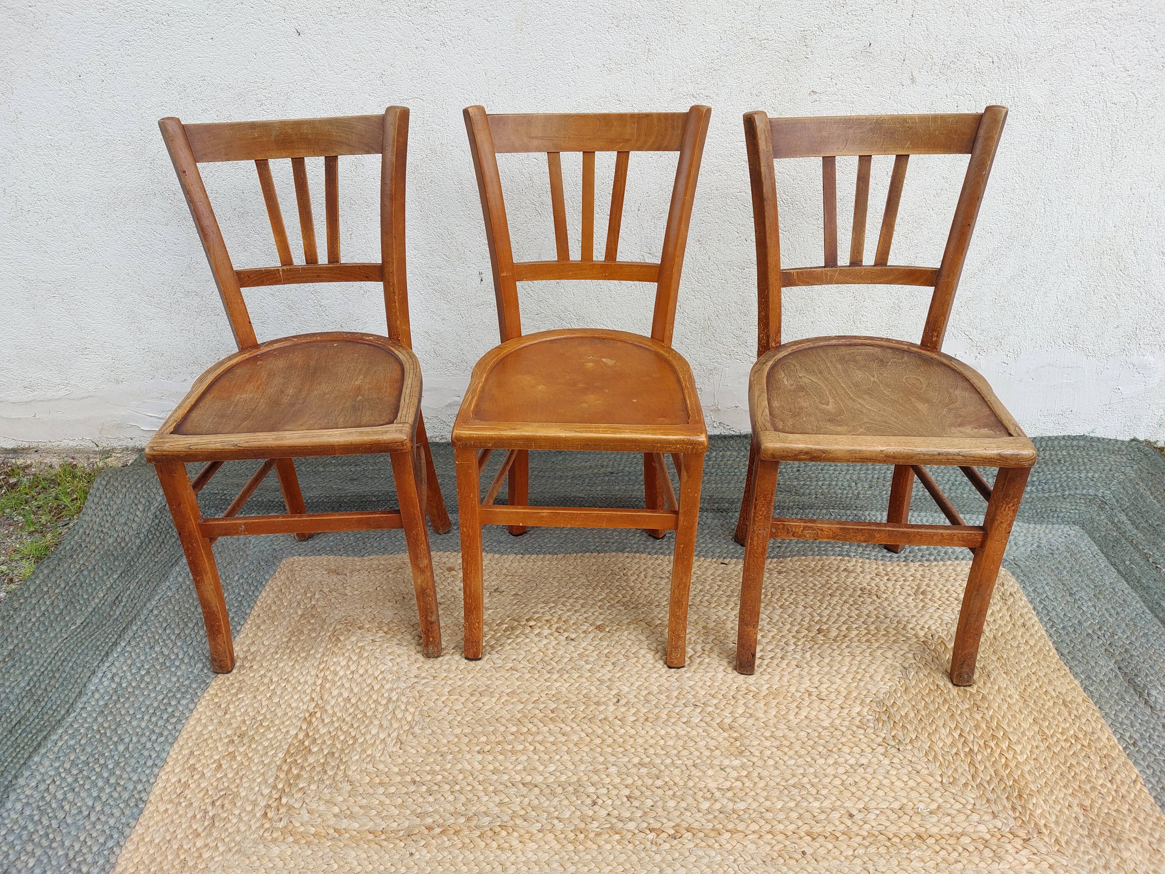 3 wooden bistro chairs