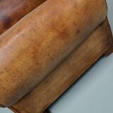 French moustache back cognac-colored leather club chair, 1940s