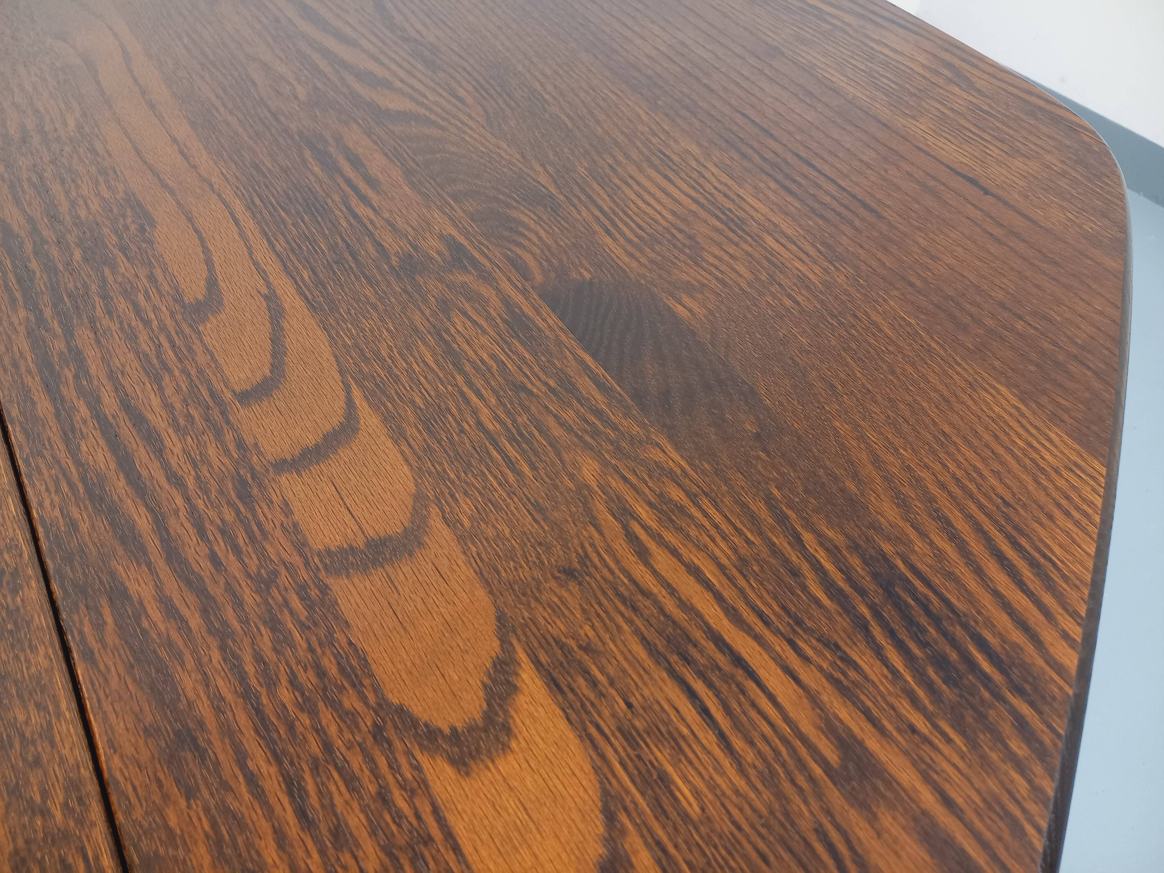 Vintage brutalist hexagonal dining table made of oak from the 1950s.