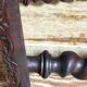 Antique stool in turned and carved solid wood