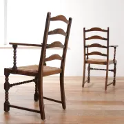 Pair of English oak armchairs with ladder back and rush seats