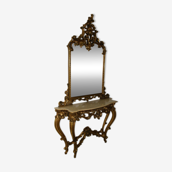 Mirror set with baroque style gilded wood console on marble top.