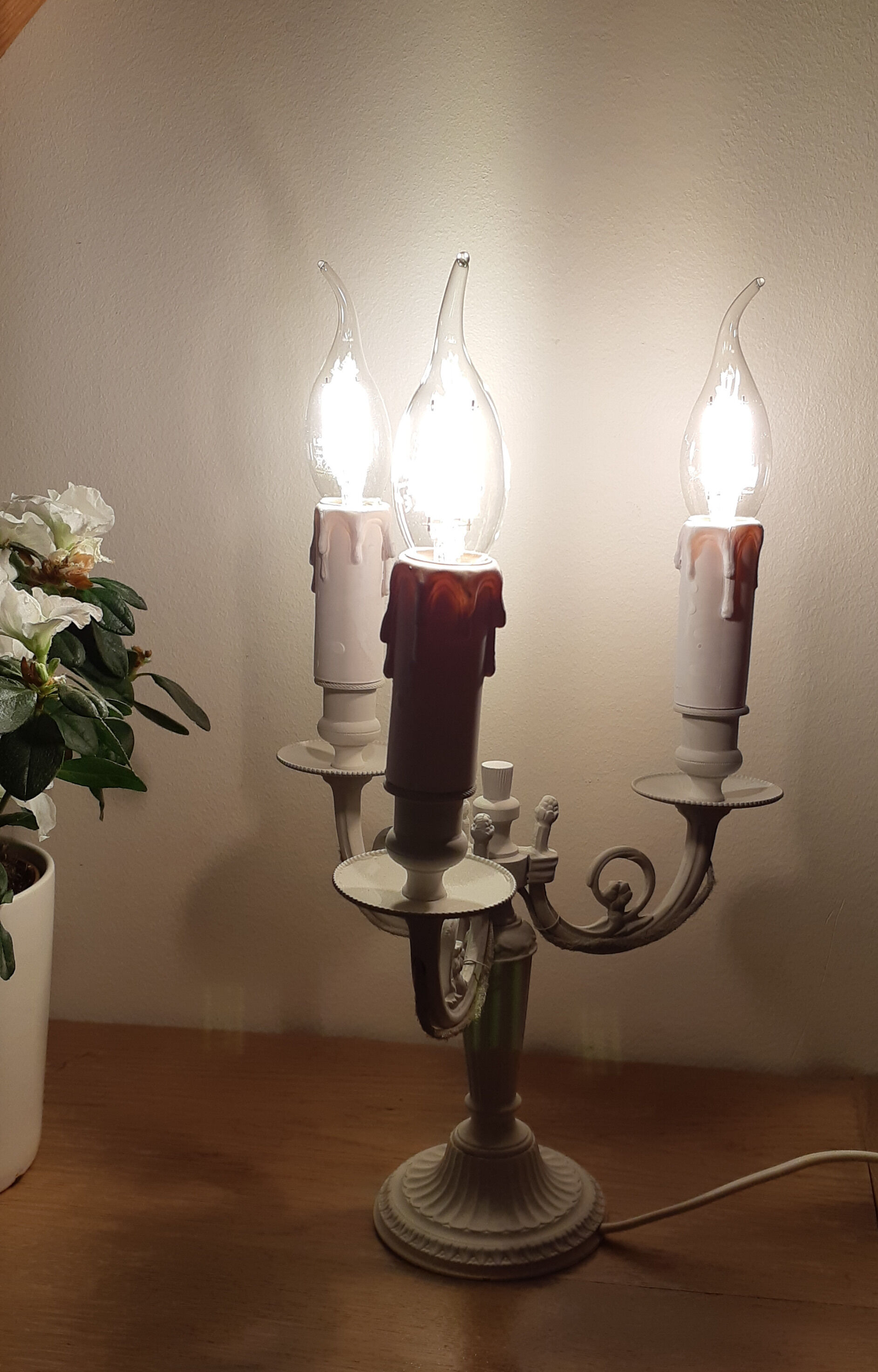 Taupe grey patinated brass candlestick