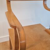 Vintage curved wood armchair