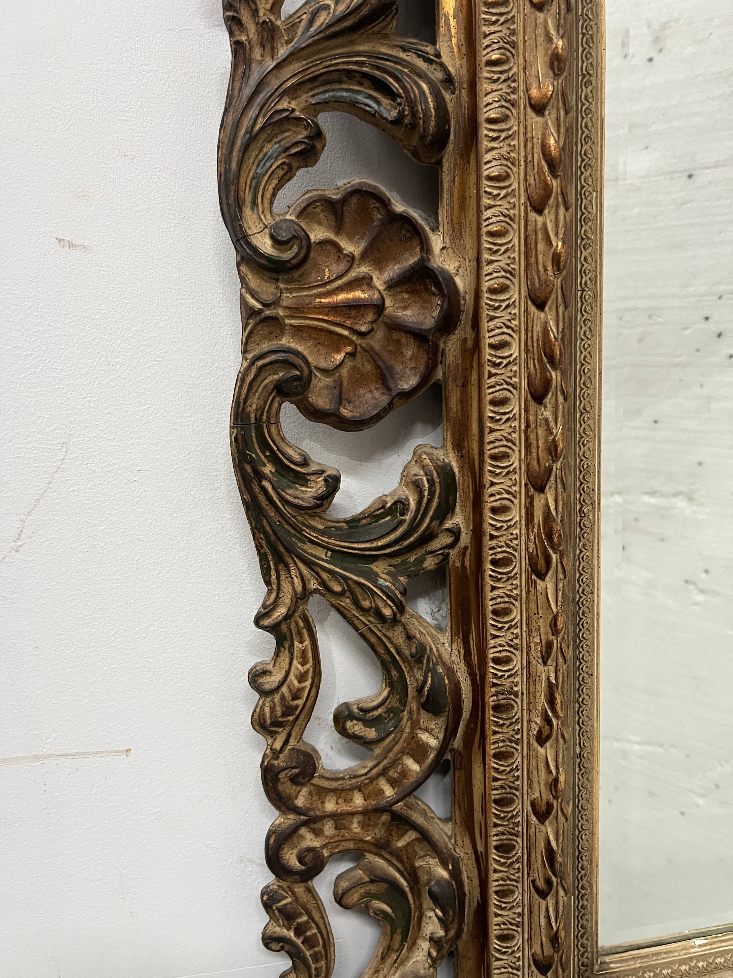 Napoleon III style mirror in carved wood, 20th century.