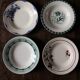 Lot 4 mismatched hollow plates Art Deco blue red green