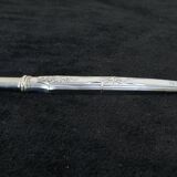 Old necessary to write 1900 in silver metal in box