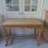 Vintage kitchen table on casters.