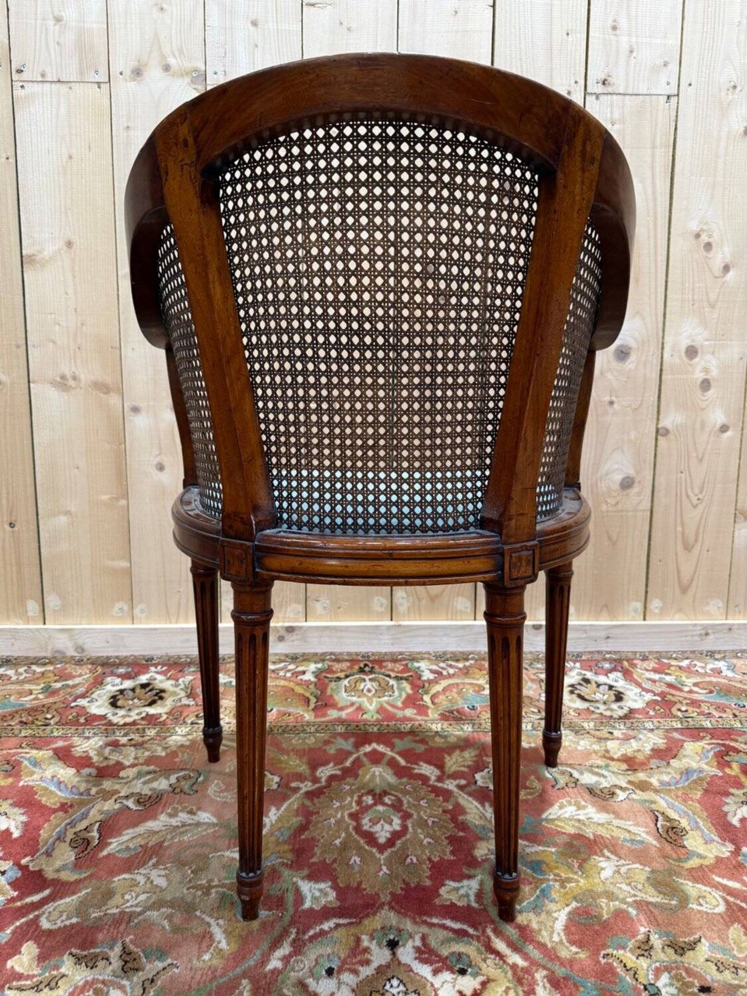 Fauteuil de bureau canné – Style Louis XVI – Bois teinté – XIXe siècle