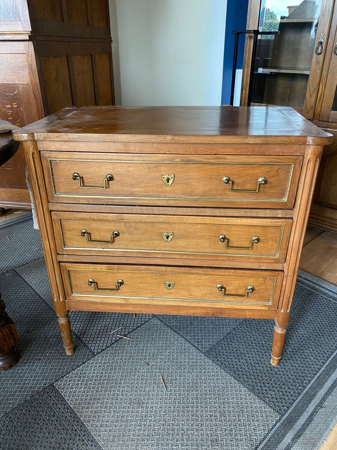Antique wooden chest of drawers gilded brass cuffs