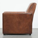 Comfortable and adjustable sheepskin relax armchair with a sleek design