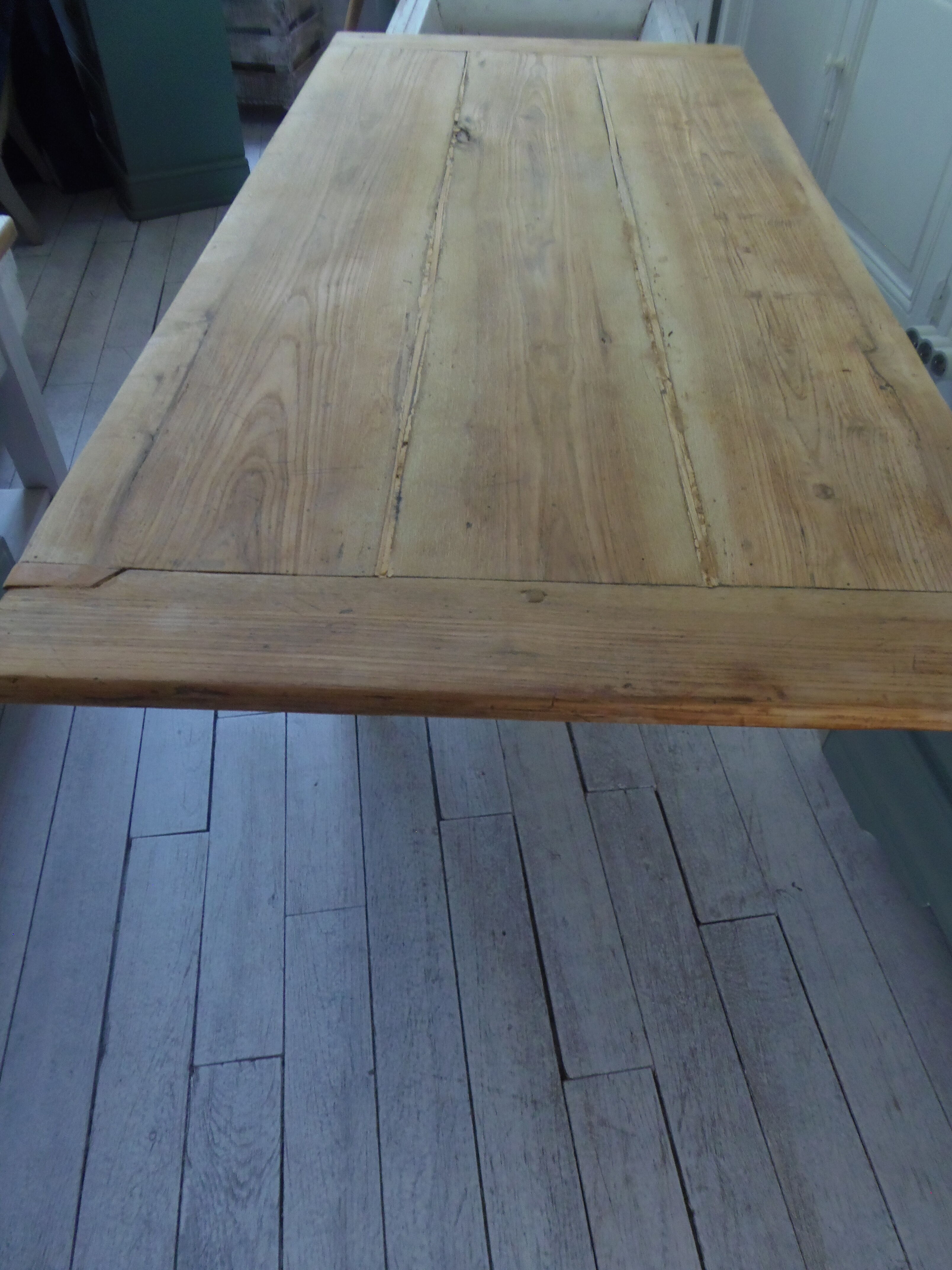 Coffee table made from an authentic farmhouse table, leg patinated pearl gray