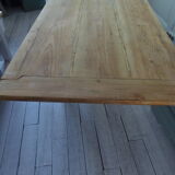 Coffee table made from an authentic farmhouse table, leg patinated pearl gray