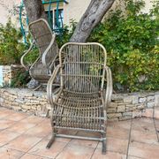 Pair of rocking-chairs in rattan 70s