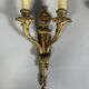 According to Jean-Charles Delafosse (1734-1791). Pair of bronze wall sconces.