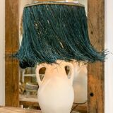 White terracotta lamp and blue raffia lampshade