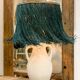 White terracotta lamp and blue raffia lampshade