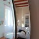 Vintage oval smoked glass mirror