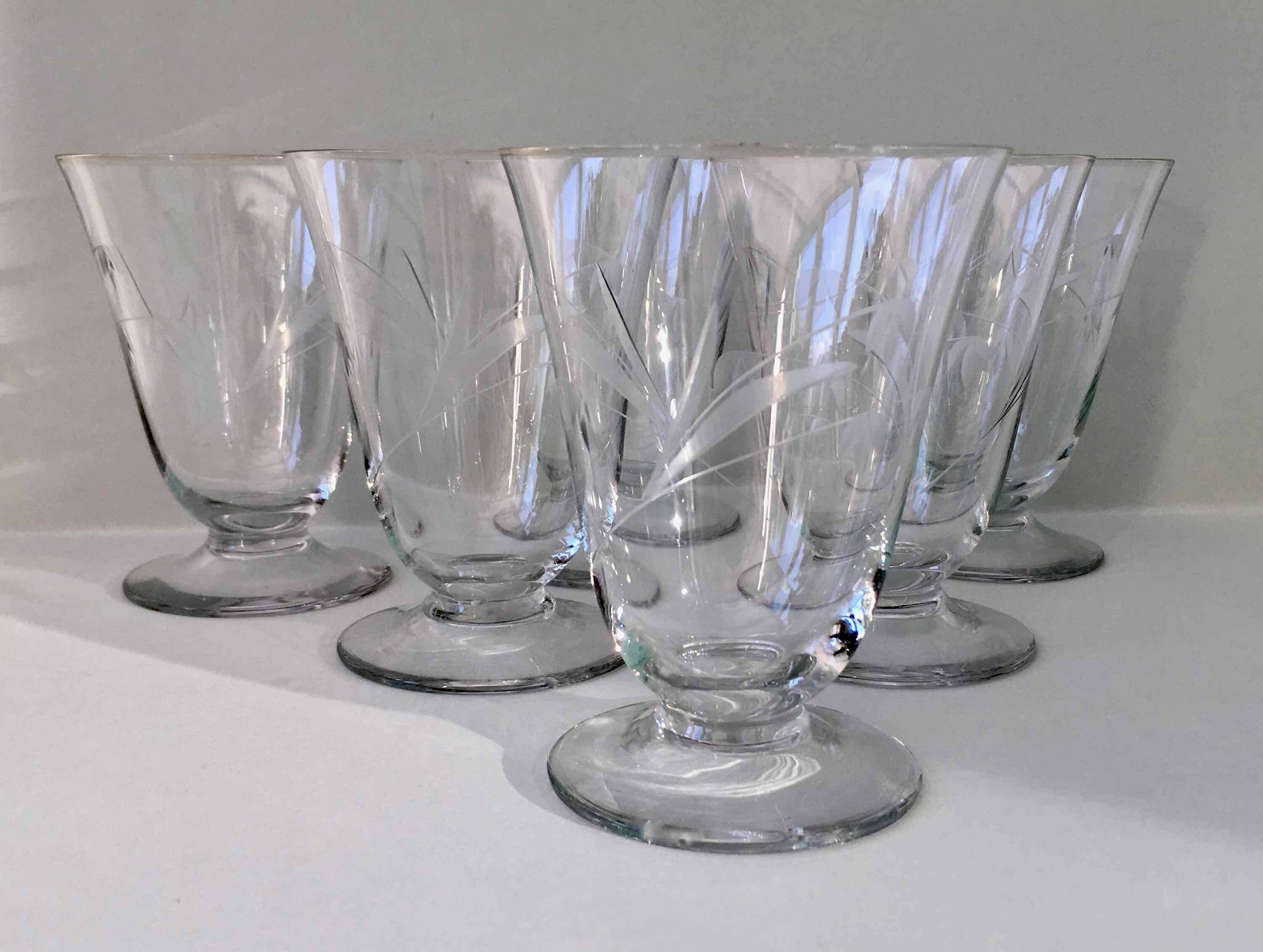 6 wine glasses carved with lily of the valley sprigs