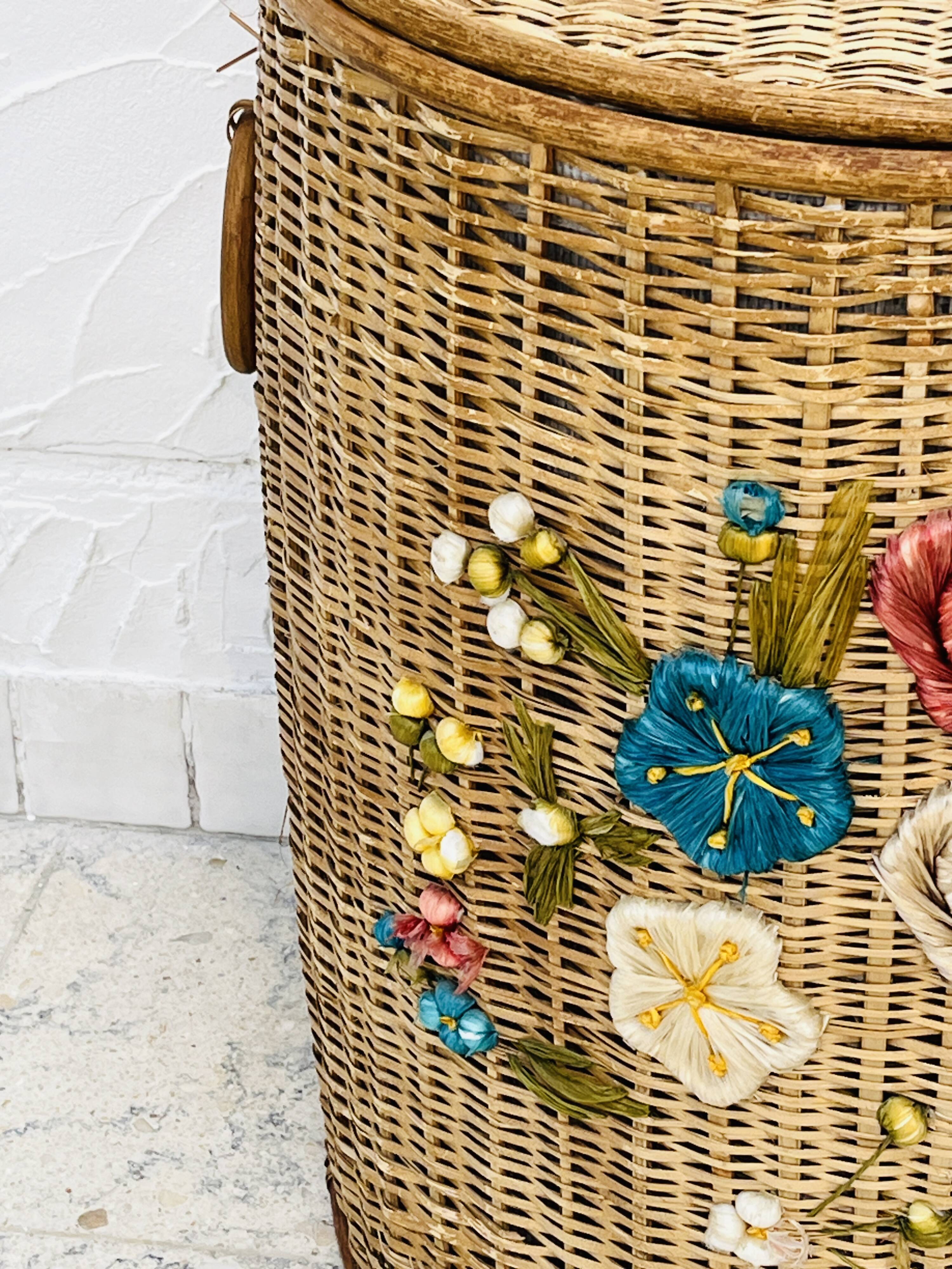 Vintage wicker mannequin with colourful floral decoration.