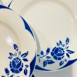 4 white porcelain plates with blue flowers