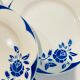 4 white porcelain plates with blue flowers