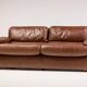 Royal 2-seater canapé premium Poltrona Frau Petronio upholstered in down and chestnut leather.