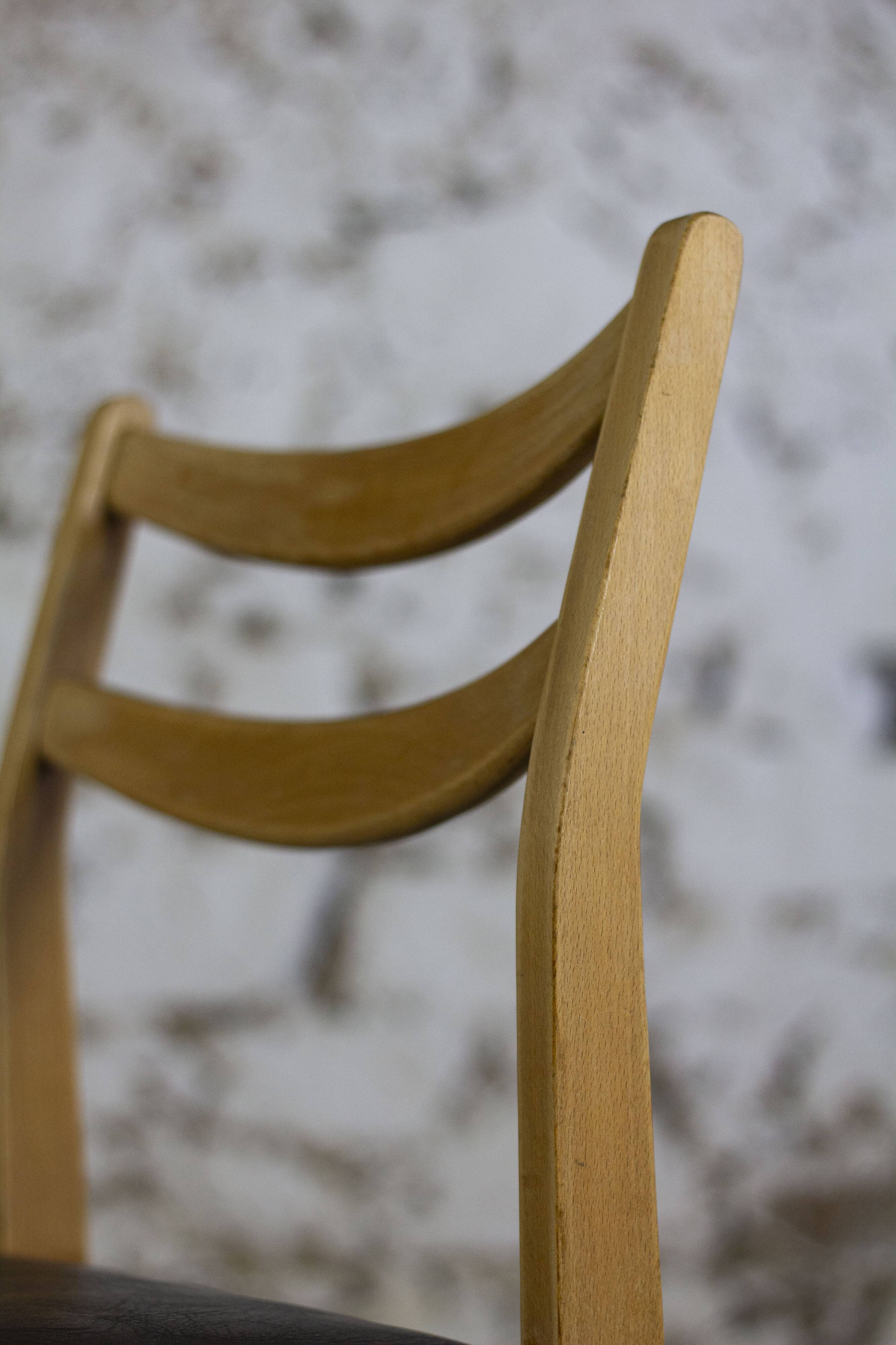 Scandinavian chair in teak and faux leather, 1960.