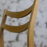 Scandinavian chair in teak and faux leather, 1960.