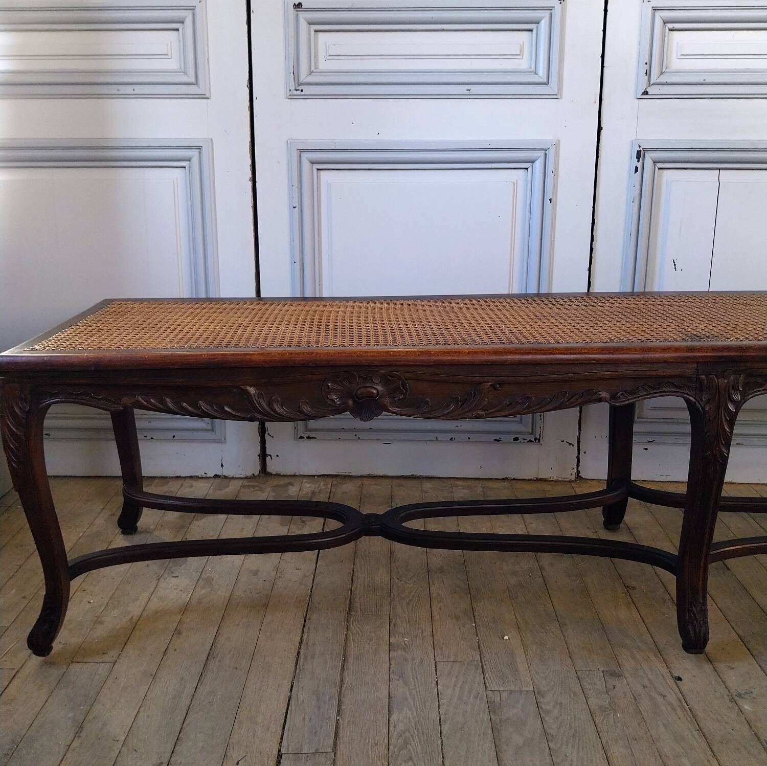 Louis XV style bench with cross-braced design