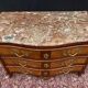 Commode galbée en marqueterie d’époque Rrégence