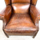 Dark brown sheep leather wingback armchair vintage