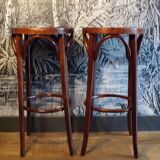 2 curved wooden bar stools